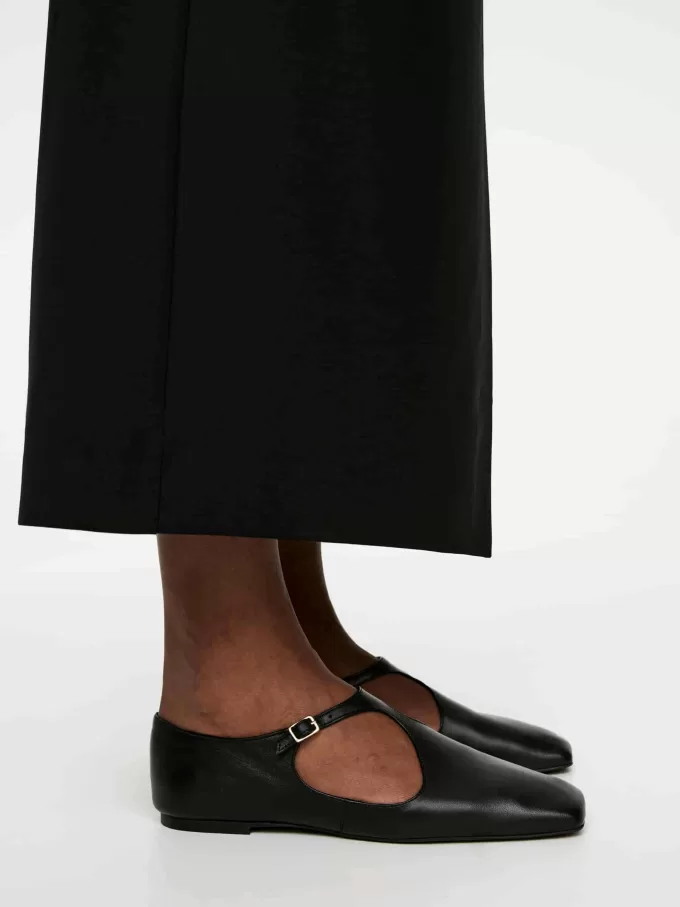 Appartamenti in pelle con fibbia