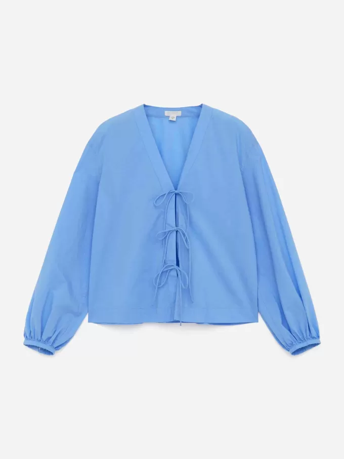 Camicetta con cravatta sul davanti Camicetta con cravatta sul davanti