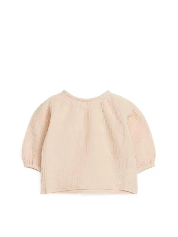 Camicetta in mussola di cotone gonfio Camicetta in mussola di cotone gonfio