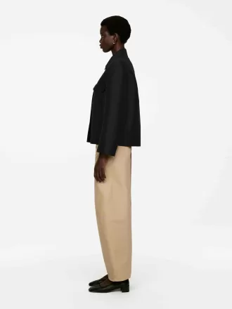 Pantaloni con gamba a botte Beige 1264795001002 1 330x440 - Pantaloni con gamba a botte