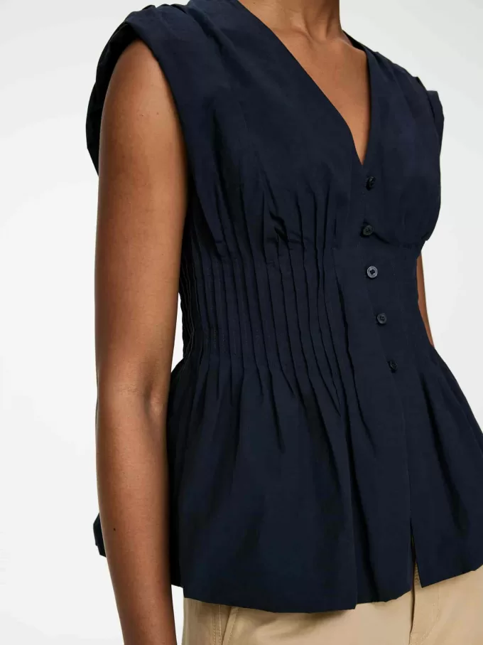 Top con nervature con orlo a palloncino Top con nervature con orlo a palloncino