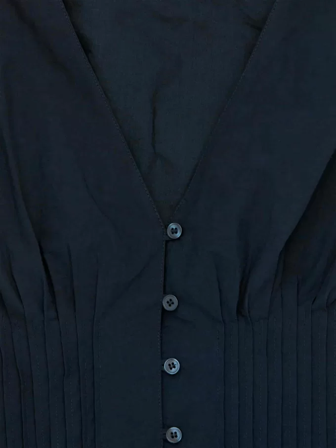 Top con nervature con orlo a palloncino Top con nervature con orlo a palloncino